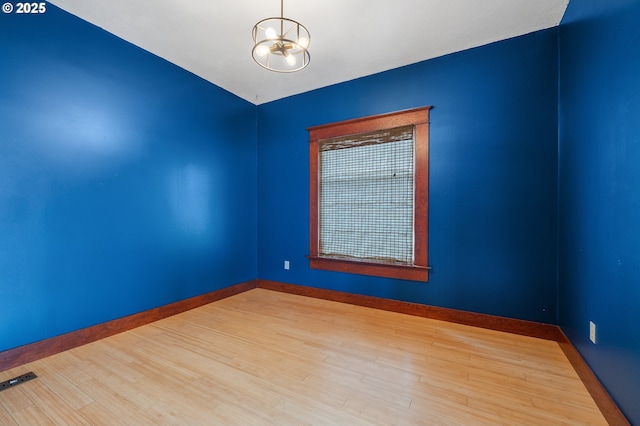 2309 7th St, Tillamook, OR 97141 - spare room with wood finished floors and baseboards