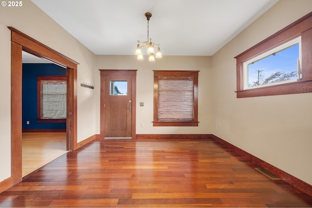 2309 7th St, Tillamook, OR 97141 - foyer entrance featuring a chandelier, wood finished floors, and baseboards