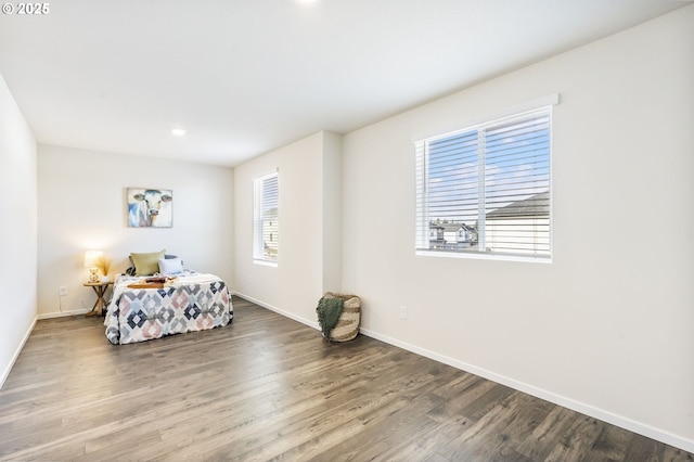 sitting room featuring wood finished floors and baseboards