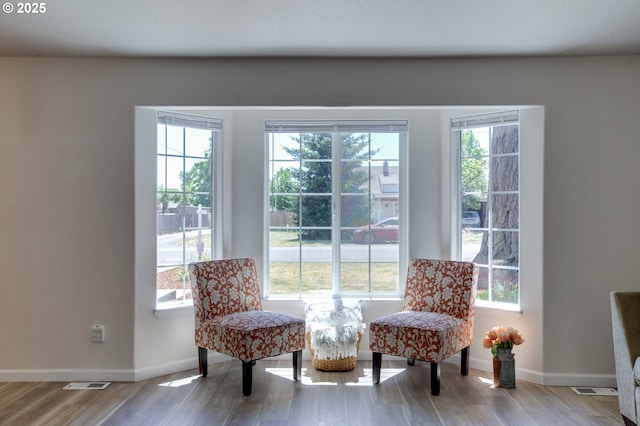 1185 Shady Ln, Keizer, OR 97303 - living area with healthy amount of natural light and wood finished floors
