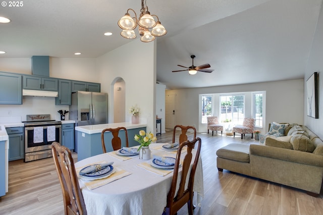 1185 Shady Ln, Keizer, OR 97303 - dining area with light wood-style floors, arched walkways, ceiling fan, a chandelier, and recessed lighting