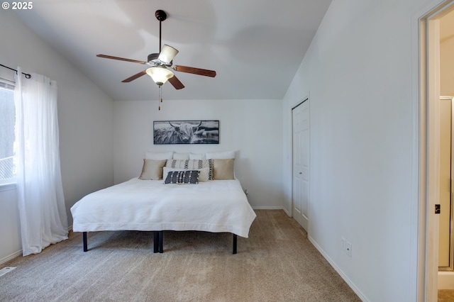 1185 Shady Ln, Keizer, OR 97303 - carpeted bedroom with multiple windows, lofted ceiling, and ceiling fan