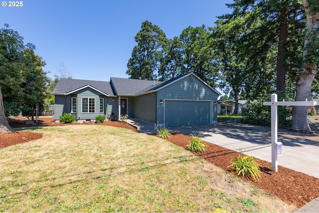 1185 Shady Ln, Keizer, OR 97303 - single story home with concrete driveway, a garage, and a front yard