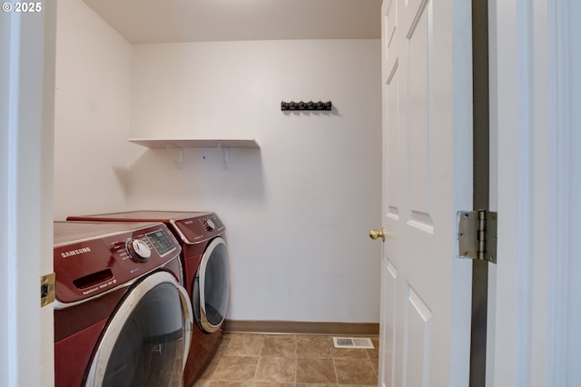 1185 Shady Ln, Keizer, OR 97303 - washroom with washer and clothes dryer and baseboards