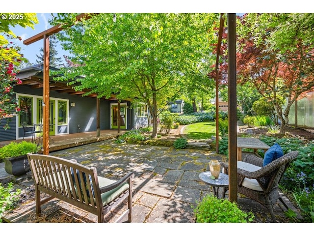 view of patio featuring a wooden deck and french doors