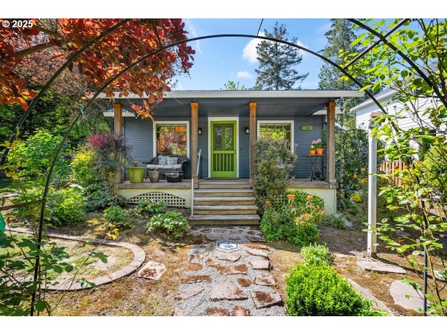 view of front of home featuring covered porch