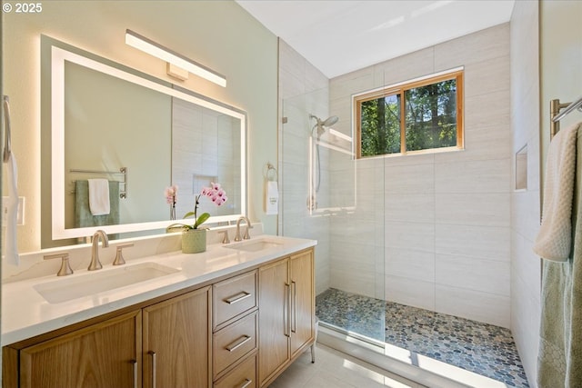 4908 SW Barnes Rd, Portland, OR 97221 - full bathroom with a tile shower, tile patterned flooring, and double vanity