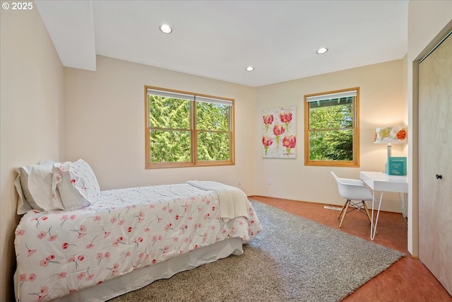 4908 SW Barnes Rd, Portland, OR 97221 - carpeted bedroom featuring multiple windows and recessed lighting
