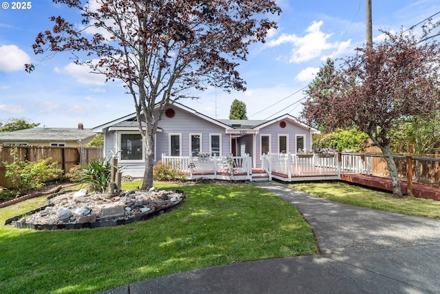409 Pacific Ave, Brookings, OR 97415 - ranch-style house featuring a wooden deck