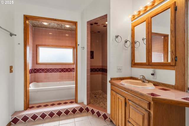 409 Pacific Ave, Brookings, OR 97415 - bathroom with tiled shower, tile patterned floors, vanity, and a tub to relax in