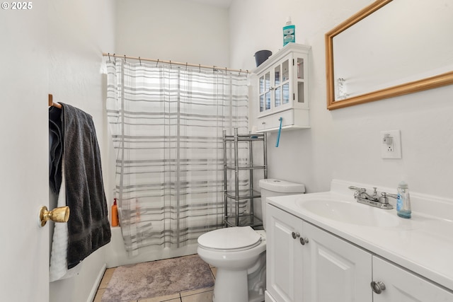 409 Pacific Ave, Brookings, OR 97415 - full bath with toilet, vanity, tile patterned flooring, and shower / tub combo with curtain