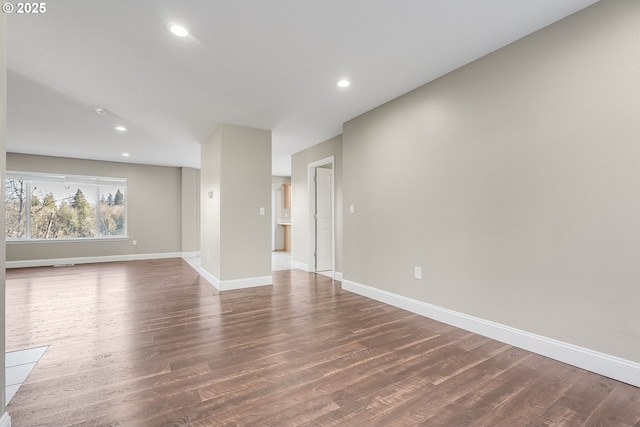 unfurnished living room with hardwood / wood-style flooring