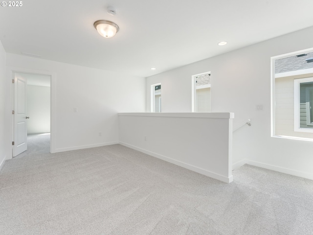 2307 SW 5th Pl, Battle Ground, WA 98604 - empty room featuring light colored carpet, baseboards, recessed lighting, and a smoke detector