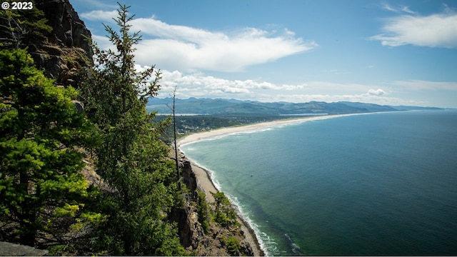 486 Meadows Dr, Manzanita, OR 97130 - water view featuring a mountainous background and nearby beach