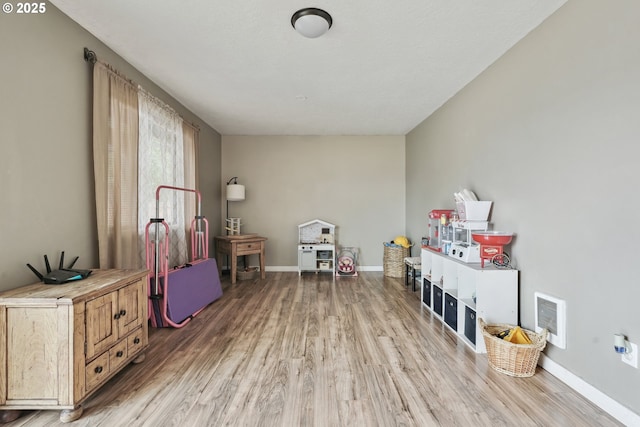 304 Frances St, Molalla, OR 97038 - recreation room featuring wood finished floors and baseboards