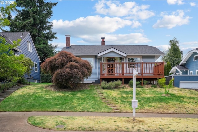 3615 NE 72nd Ave, Portland, OR 97213 - view of front of home featuring a front yard, a chimney, and a wooden deck