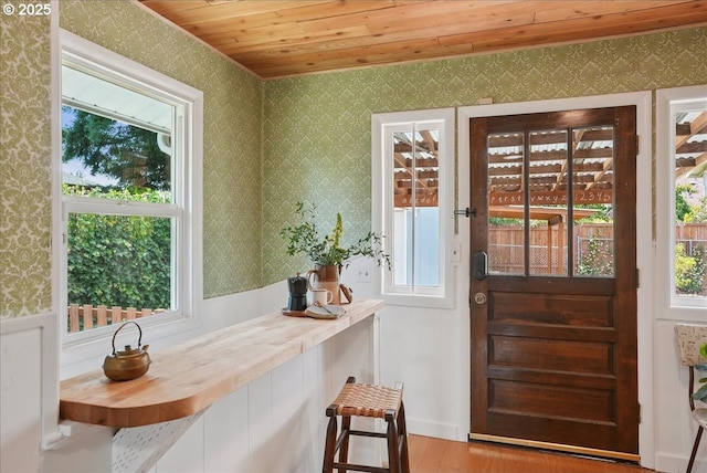 3615 NE 72nd Ave, Portland, OR 97213 - entryway with wallpapered walls, wood finished floors, and wooden ceiling