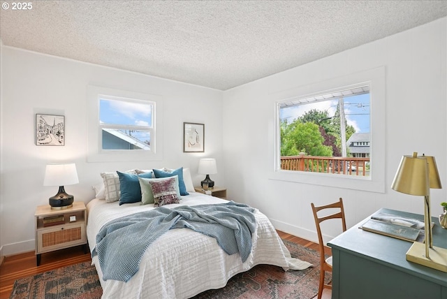 3615 NE 72nd Ave, Portland, OR 97213 - bedroom with wood finished floors and a textured ceiling