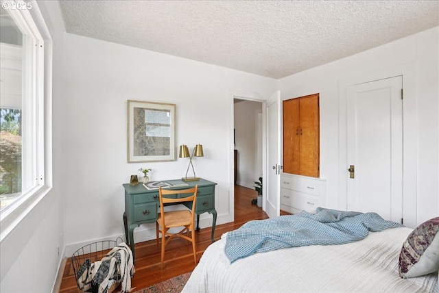 3615 NE 72nd Ave, Portland, OR 97213 - bedroom featuring wood finished floors and a textured ceiling
