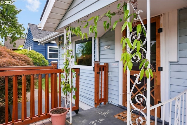 3615 NE 72nd Ave, Portland, OR 97213 - property entrance featuring a shingled roof and covered porch