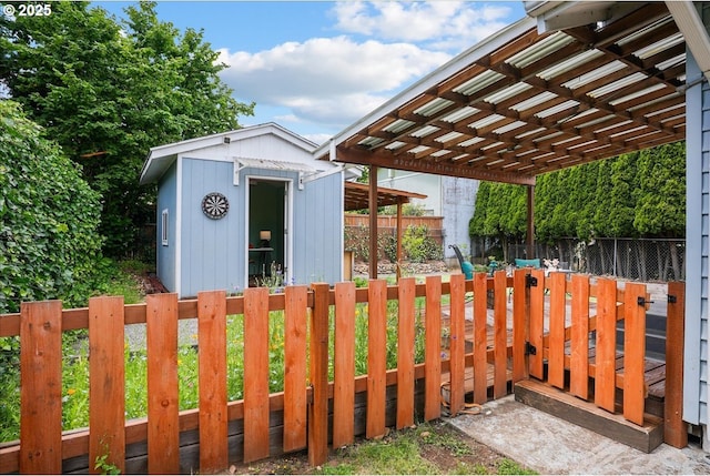 3615 NE 72nd Ave, Portland, OR 97213 - fenced backyard with a storage unit and a pergola