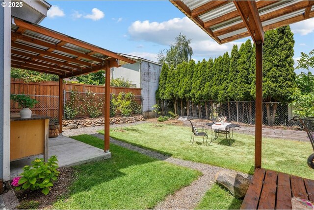 3615 NE 72nd Ave, Portland, OR 97213 - fenced backyard featuring a patio area