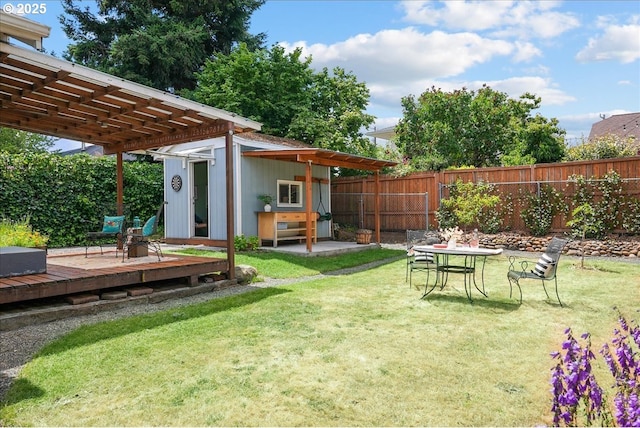 3615 NE 72nd Ave, Portland, OR 97213 - fenced backyard with a deck, an outbuilding, and a pergola