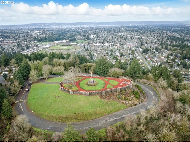 aerial view of property and surrounding area with a recreational park