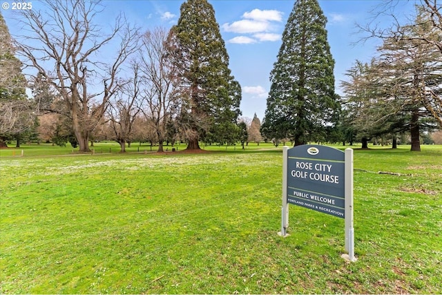 surrounding community with a yard