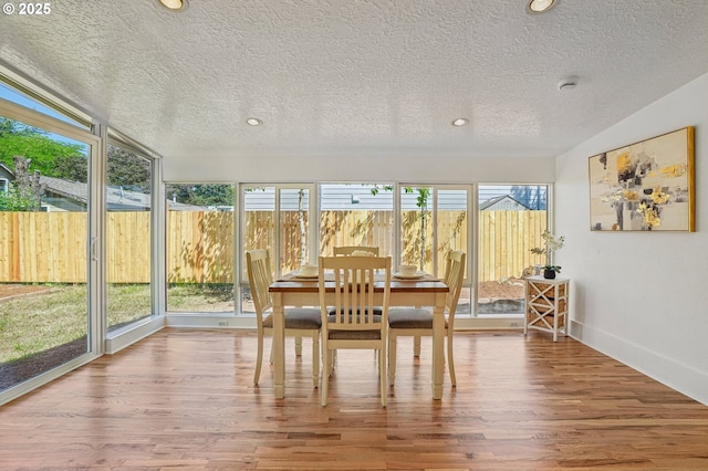1952 SE 139th Ave, Portland, OR 97233 - sunroom / solarium with plenty of natural light, a textured ceiling, wood finished floors, baseboards, and recessed lighting
