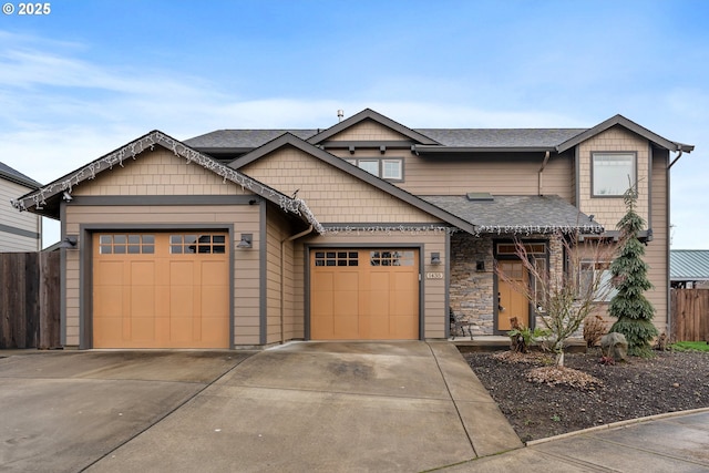 craftsman inspired home with a garage