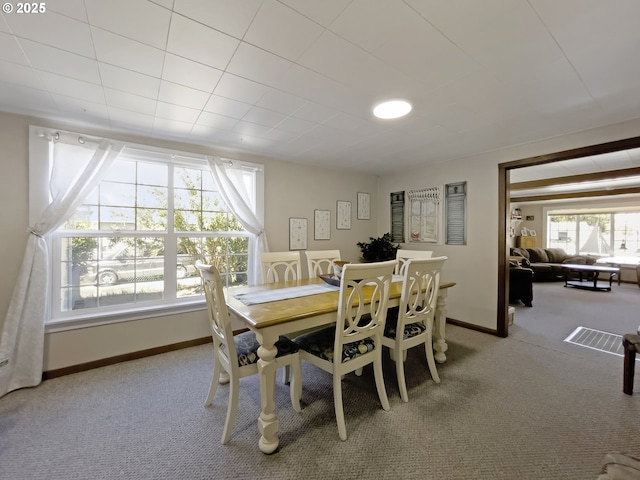 97994 W Benham Ln, Brookings, OR 97415 - carpeted dining space with baseboards
