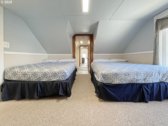 97994 W Benham Ln, Brookings, OR 97415 - bedroom with carpet flooring and vaulted ceiling