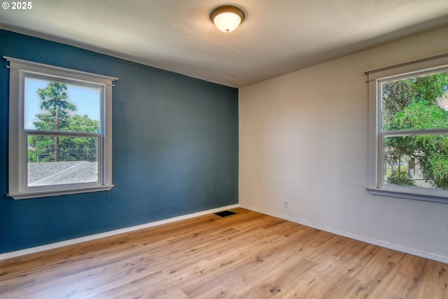 501 NW 6th St, Pendleton, OR 97801 - spare room featuring wood finished floors and baseboards