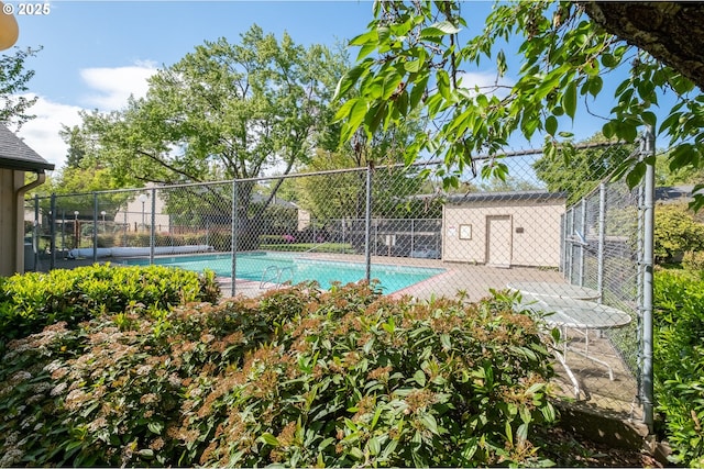 view of pool featuring fence