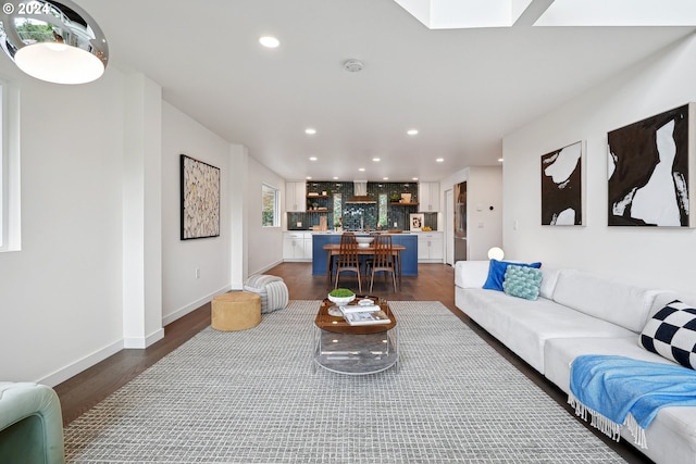 living room featuring dark hardwood / wood-style flooring