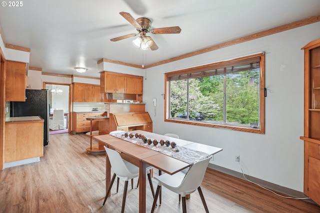 5955 NE 32nd Ave, Portland, OR 97211 - dining area featuring a ceiling fan and light wood-style floors