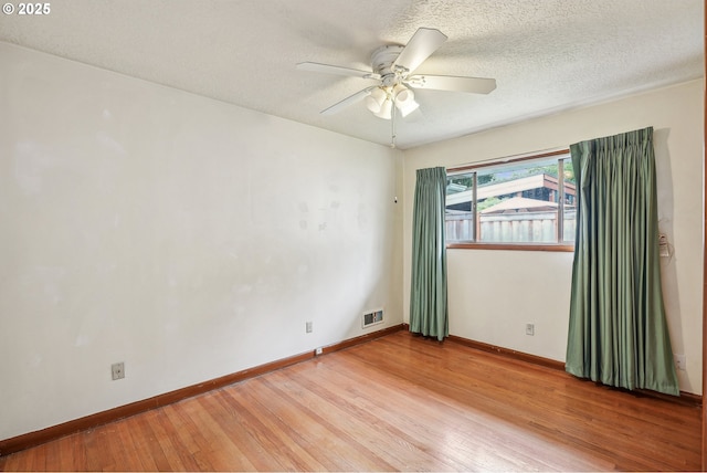 5955 NE 32nd Ave, Portland, OR 97211 - unfurnished room with a ceiling fan, baseboards, light wood finished floors, and visible vents