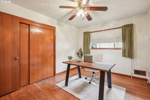 5955 NE 32nd Ave, Portland, OR 97211 - office space featuring light wood-style flooring, a textured ceiling, baseboards, and visible vents