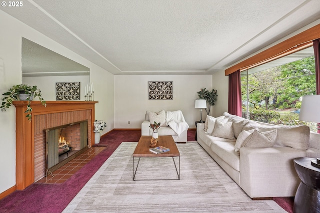 5955 NE 32nd Ave, Portland, OR 97211 - carpeted living area with baseboards, a fireplace, and a textured ceiling