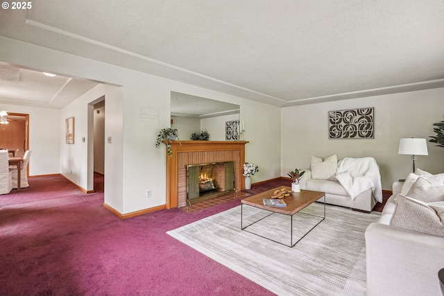 5955 NE 32nd Ave, Portland, OR 97211 - living room featuring carpet, baseboards, and a brick fireplace