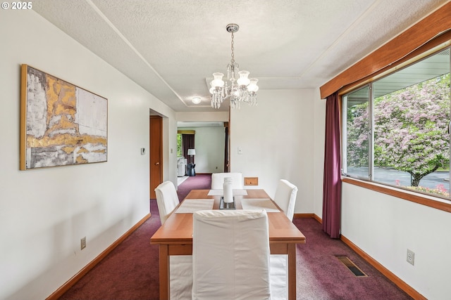 5955 NE 32nd Ave, Portland, OR 97211 - dining area with a chandelier, a textured ceiling, visible vents, and carpet floors