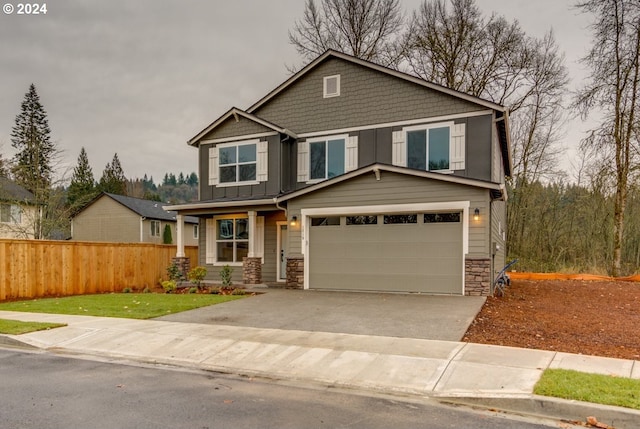 craftsman-style home featuring a garage