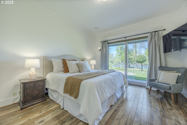 2892 Riverwalk Loop, Eugene, OR 97401 - bedroom with wood-type flooring, access to outside, crown molding, and ensuite bath