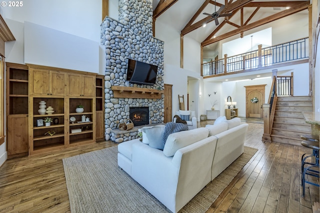 2892 Riverwalk Loop, Eugene, OR 97401 - dining space with a notable chandelier, arched walkways, a wainscoted wall, hardwood / wood-style floors, and a tray ceiling