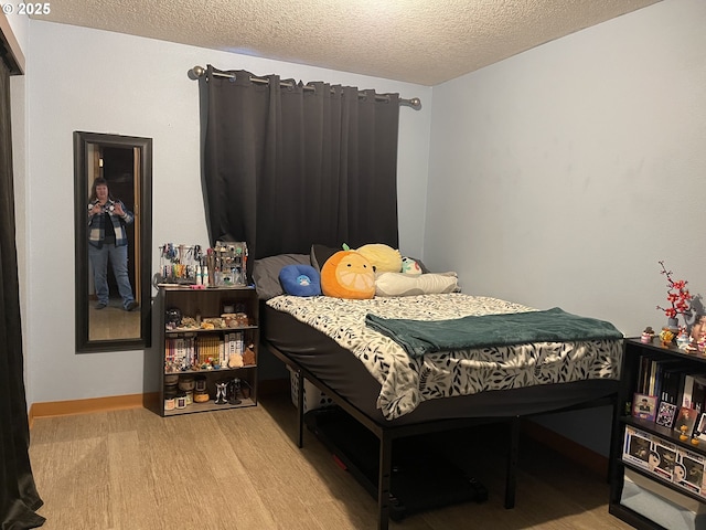 bedroom with a textured ceiling