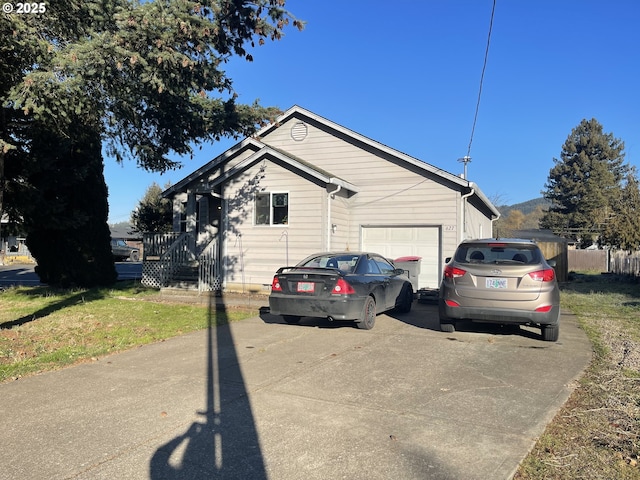 view of property exterior with a garage