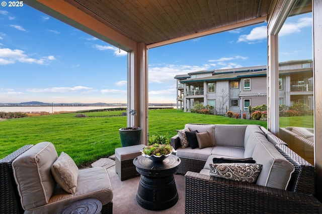 view of patio featuring an outdoor hangout area and a water view