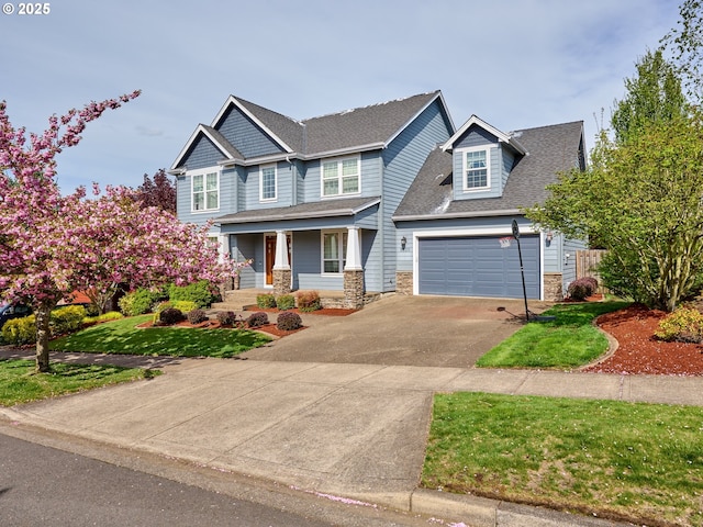 craftsman-style house featuring a porch, aphalt driveway, roof with shingles, stone siding, and a front lawn