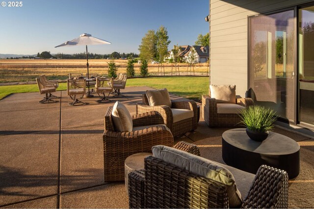 view of patio / terrace featuring outdoor dining area and an outdoor hangout area